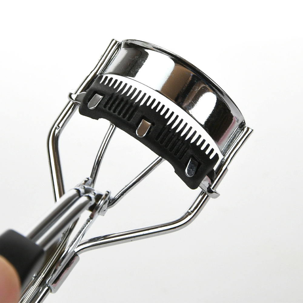 Pink Heart Handle Eyelash Curler med indbygget kam